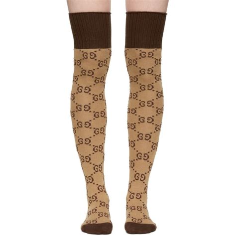 thigh high gucci socks|Gucci stockings with runs.